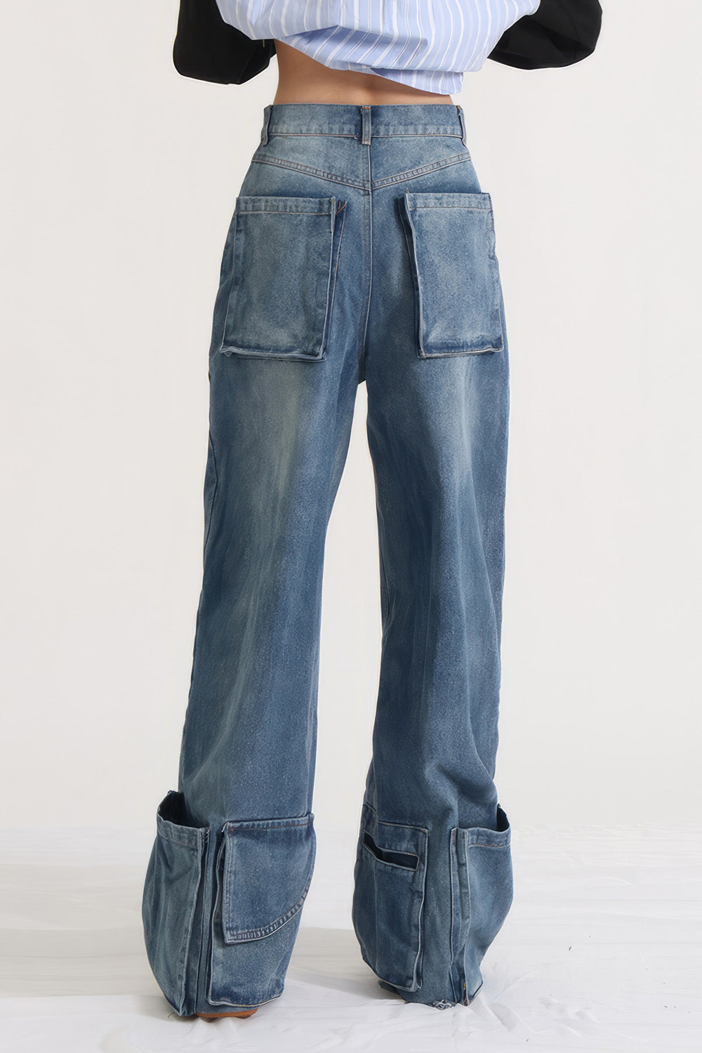 Jeans med hög midja och fickor i nederkant - Blå
