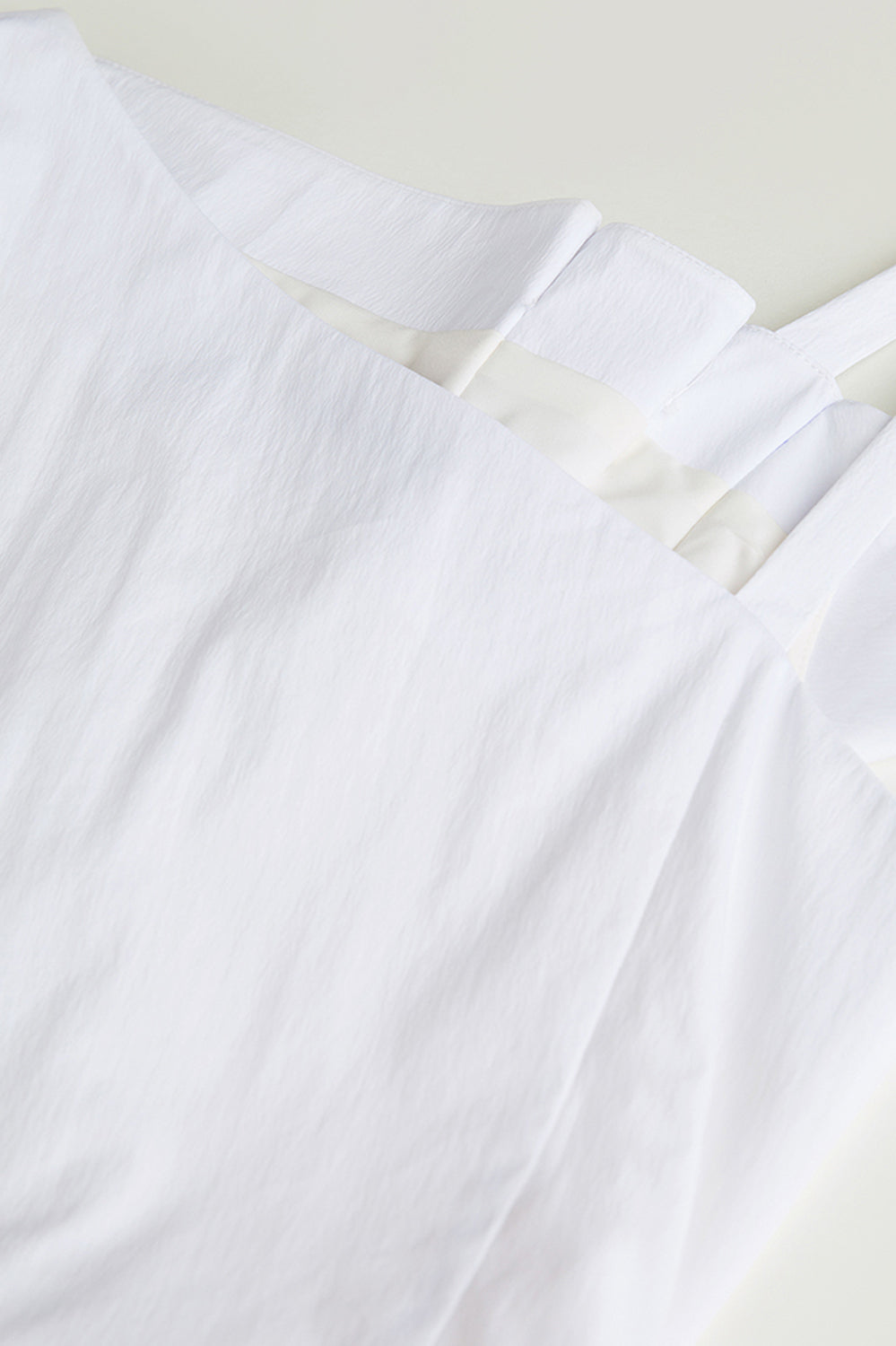 Nieregularna sukienka midi - biała